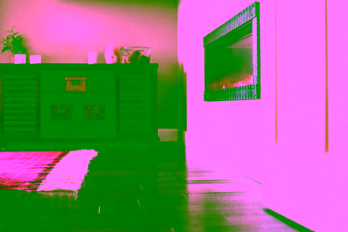 Dark espresso hardwood floors beside a fireplace, low angle
